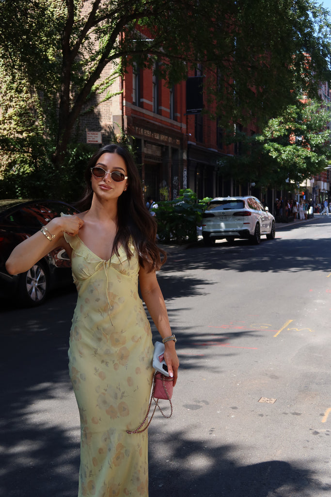 Ankle length maxi sun dress
Sheer frill detail at neckline and shoulder
Non-adjustable tie at neckline center